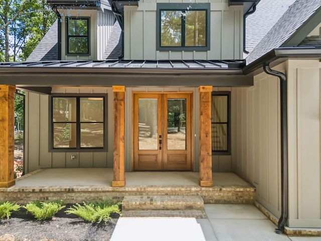 1007 Pheasant Ct, Kingston Springs, TN 37082 - doorway to property featuring a standing seam roof, roof with shingles, board and batten siding, a metal roof, and a porch