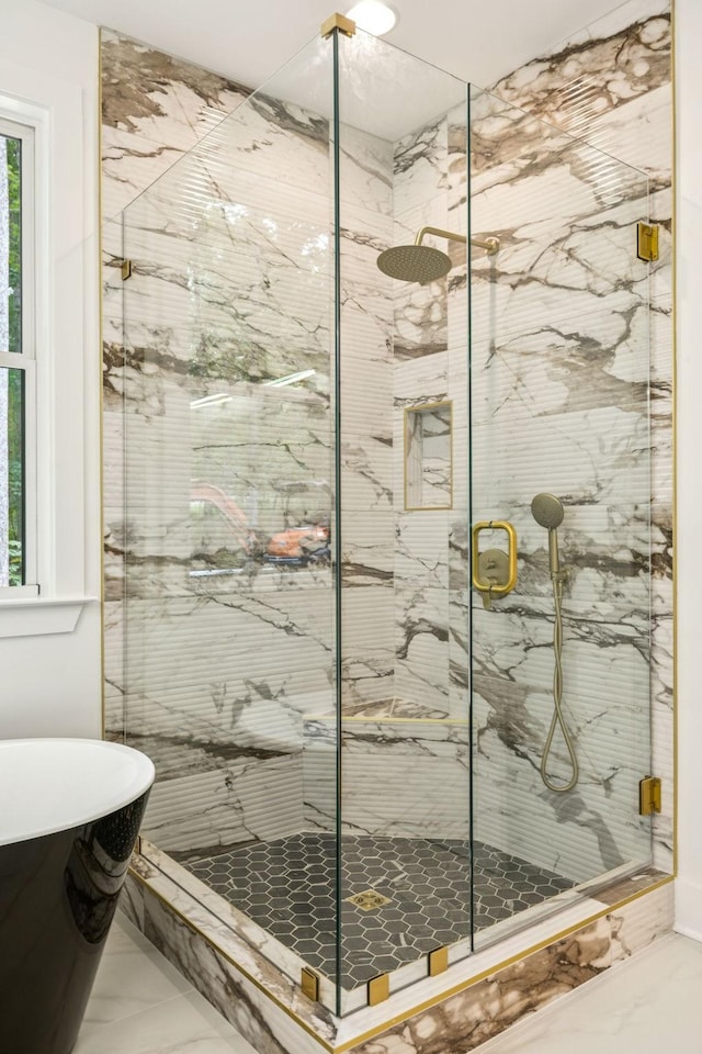 1007 Pheasant Ct, Kingston Springs, TN 37082 - bathroom featuring marble look tile flooring, a marble finish shower, and a soaking tub