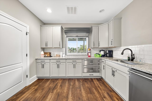 751 Pebble Creek Ln, Lebanon, TN 37090 - kitchen featuring stainless steel dishwasher, dark wood-style floors, decorative backsplash, and recessed lighting