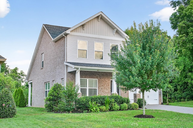 751 Pebble Creek Ln, Lebanon, TN 37090 - view of front of property featuring a front yard, driveway, a garage, and brick siding