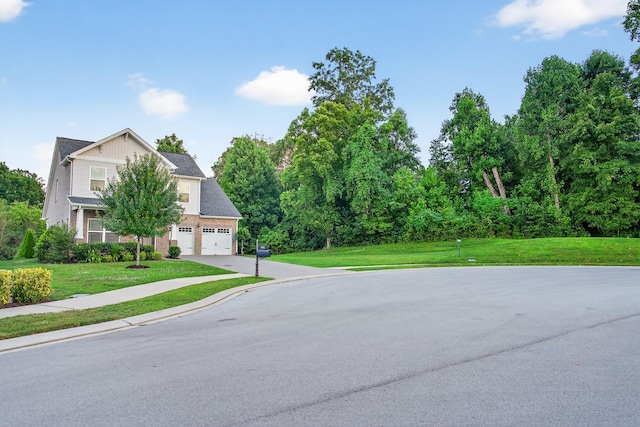 751 Pebble Creek Ln, Lebanon, TN 37090 - view of front of house with concrete driveway, a front lawn, and a garage