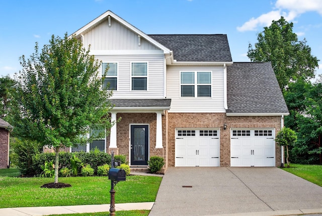 751 Pebble Creek Ln, Lebanon, TN 37090 - craftsman-style house with concrete driveway, board and batten siding, brick siding, an attached garage, and a front yard
