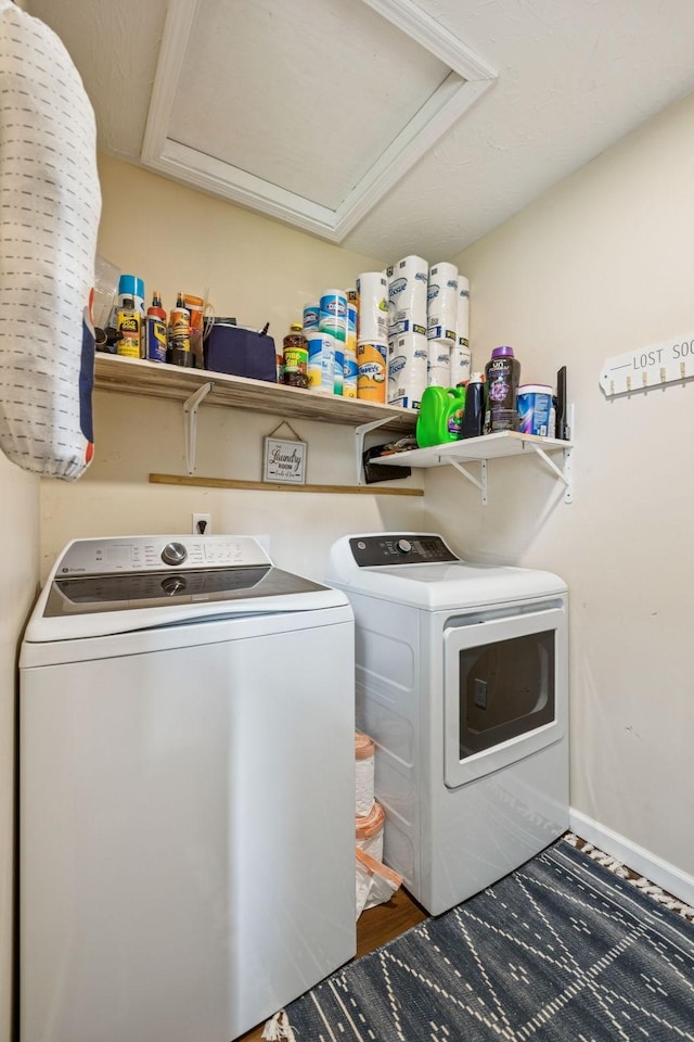 906 Freeman St, Lafayette, TN 37083 - washroom with washing machine and dryer and baseboards