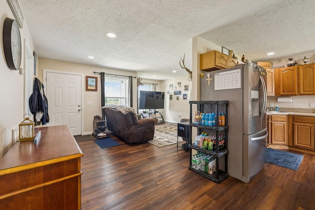 906 Freeman St, Lafayette, TN 37083 - living room with dark wood-style floors, a textured ceiling, and recessed lighting