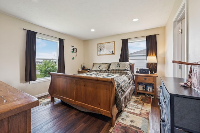 906 Freeman St, Lafayette, TN 37083 - bedroom with dark wood-style floors and recessed lighting