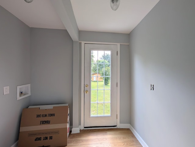 406 Horton St, Decherd, TN 37324 - doorway to outside featuring wood finished floors and baseboards