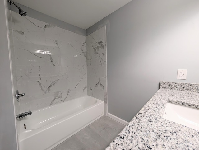 406 Horton St, Decherd, TN 37324 - full bathroom featuring shower / tub combination, vanity, and marble look tiles