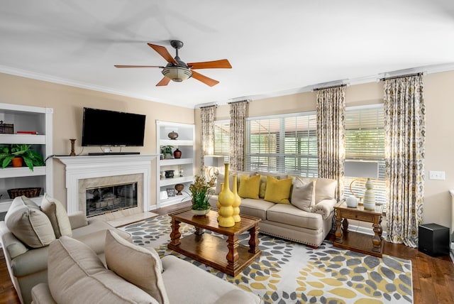 4305 Minette Ct, Mount Juliet, TN 37122 - living area featuring a ceiling fan, wood finished floors, ornamental molding, a high end fireplace, and built in shelves