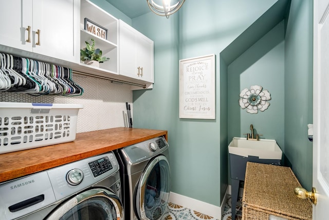 4305 Minette Ct, Mount Juliet, TN 37122 - washroom with washer and clothes dryer and cabinet space