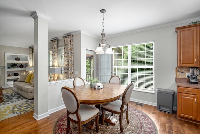 4305 Minette Ct, Mount Juliet, TN 37122 - dining room with wood finished floors, crown molding, and ornate columns
