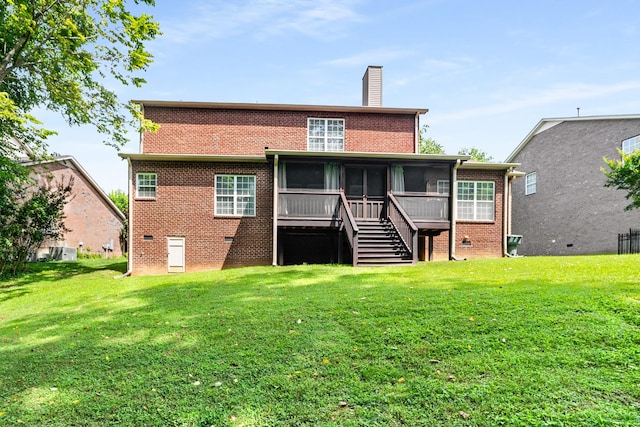 4305 Minette Ct, Mount Juliet, TN 37122 - back of property with a sunroom, a chimney, brick siding, crawl space, and a yard