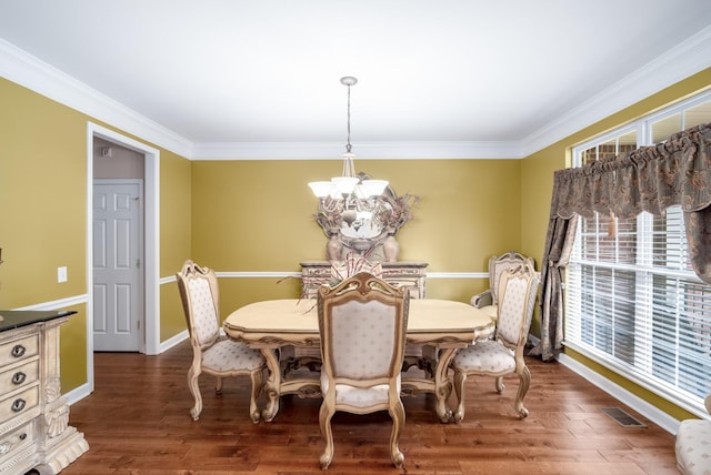 4305 Minette Ct, Mount Juliet, TN 37122 - dining area with a chandelier, ornamental molding, and wood finished floors
