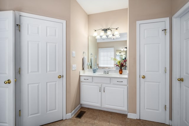 4305 Minette Ct, Mount Juliet, TN 37122 - bathroom with vanity, tile patterned flooring, and a chandelier