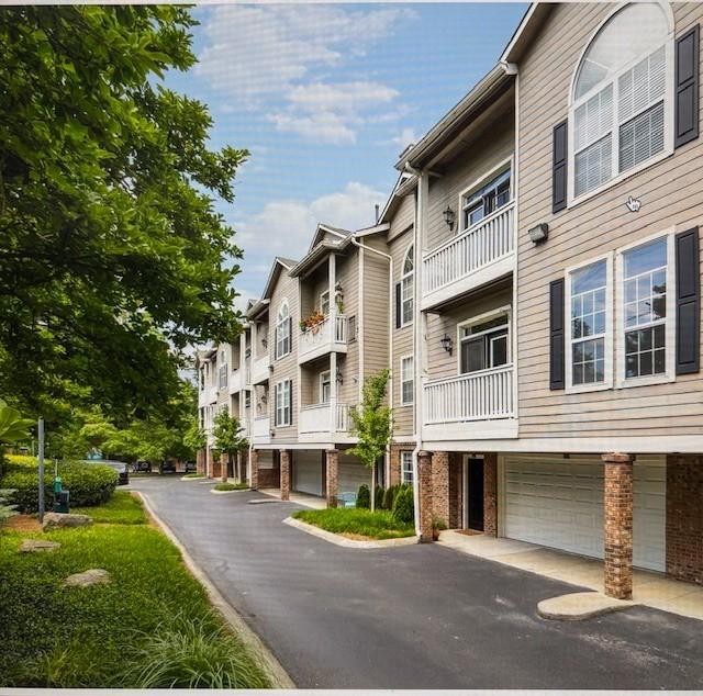 2083 Stokes Ln, Nashville, TN 37215 - view of building exterior with a garage and driveway