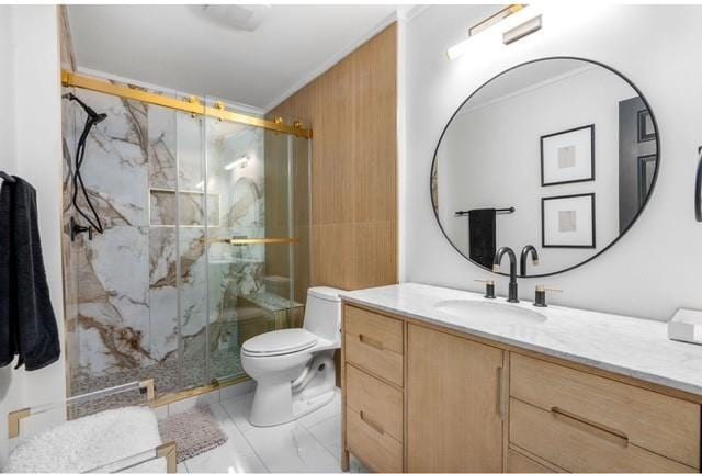 2083 Stokes Ln, Nashville, TN 37215 - full bathroom with vanity, a marble finish shower, crown molding, and marble look tiles