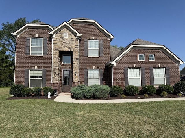 812 Topaz Dr, Murfreesboro, TN 37128 - traditional-style home with a front yard and brick siding