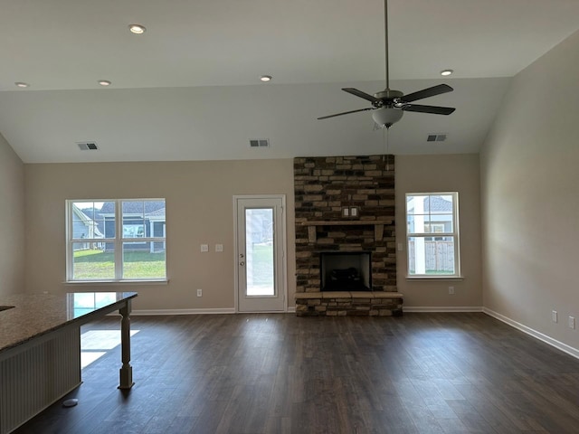 1004 Wiseman Farm Rd, Fairview, TN 37062 - unfurnished living room with healthy amount of natural light, dark wood-style floors, vaulted ceiling, ceiling fan, and a fireplace