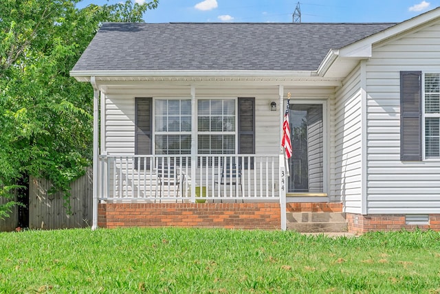 344 Pioneer Dr, Oak Grove, KY 42262 - view of exterior entry with covered porch and a shingled roof