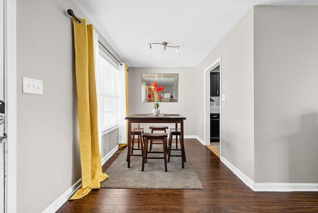 344 Pioneer Dr, Oak Grove, KY 42262 - dining area featuring wood finished floors and baseboards