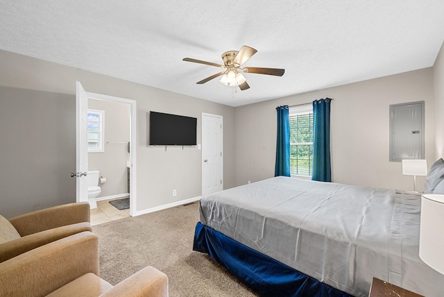 344 Pioneer Dr, Oak Grove, KY 42262 - carpeted bedroom featuring electric panel, connected bathroom, and ceiling fan