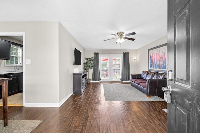 344 Pioneer Dr, Oak Grove, KY 42262 - living room with ceiling fan, wood finished floors, and a fireplace
