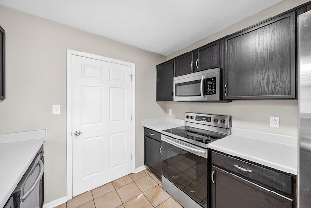 344 Pioneer Dr, Oak Grove, KY 42262 - kitchen with appliances with stainless steel finishes, light tile patterned floors, and light countertops
