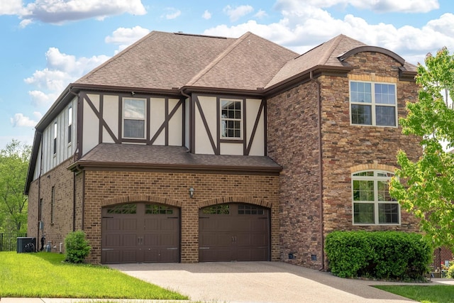 230 Fowler Cir, Franklin, TN 37064 - view of front of property featuring stucco siding, concrete driveway, a garage, and a shingled roof