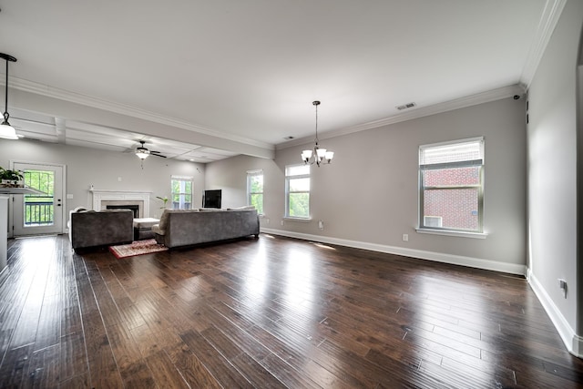 230 Fowler Cir, Franklin, TN 37064 - living room featuring a fireplace, ceiling fan, dark wood-style floors, a chandelier, and crown molding