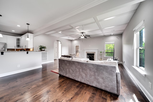 230 Fowler Cir, Franklin, TN 37064 - living room with ceiling fan, coffered ceiling, dark wood-style flooring, arched walkways, and recessed lighting
