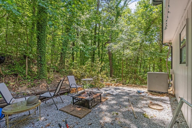 3222 Joselin Ln, Chattanooga, TN 37415 - view of patio featuring a fire pit and a view of trees