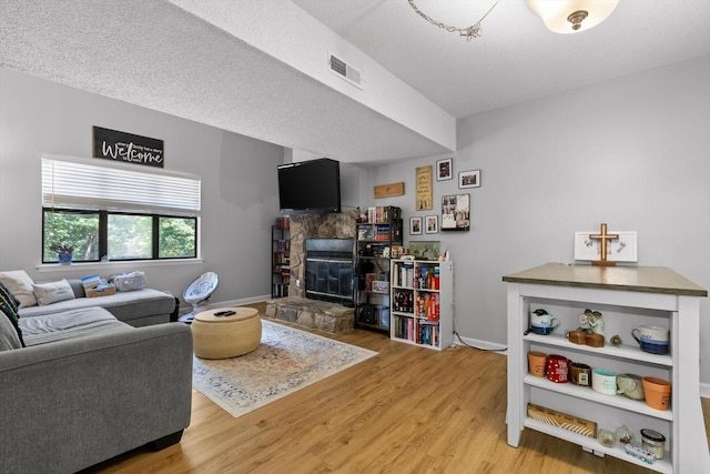3222 Joselin Ln, Chattanooga, TN 37415 - living room featuring wood finished floors and a fireplace