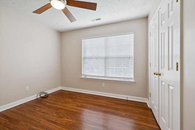 7023 Timber Oak Dr, Mount Juliet, TN 37122 - unfurnished bedroom with wood finished floors, a textured ceiling, a closet, and ceiling fan