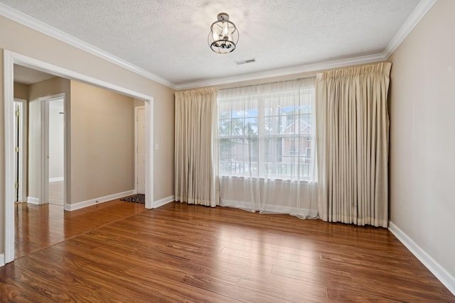 7023 Timber Oak Dr, Mount Juliet, TN 37122 - empty room with a textured ceiling, crown molding, and wood finished floors