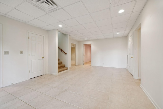 7023 Timber Oak Dr, Mount Juliet, TN 37122 - spare room with stairs, recessed lighting, a drop ceiling, and light tile patterned flooring
