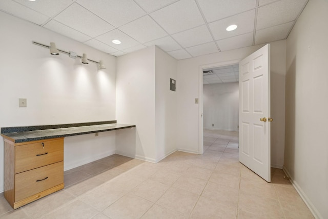 7023 Timber Oak Dr, Mount Juliet, TN 37122 - hallway featuring light tile patterned flooring, a paneled ceiling, an office area, and recessed lighting