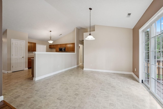 7023 Timber Oak Dr, Mount Juliet, TN 37122 - unfurnished living room featuring lofted ceiling and baseboards