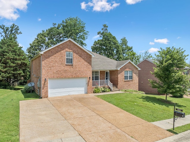 7023 Timber Oak Dr, Mount Juliet, TN 37122 - view of front of house featuring brick siding, a front yard, driveway, and a garage