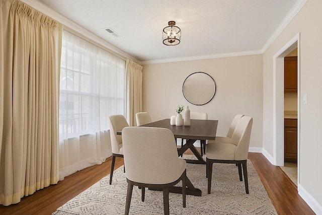 7023 Timber Oak Dr, Mount Juliet, TN 37122 - dining space featuring ornamental molding and dark wood finished floors