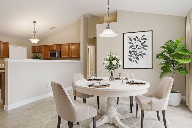 7023 Timber Oak Dr, Mount Juliet, TN 37122 - dining space featuring vaulted ceiling and baseboards