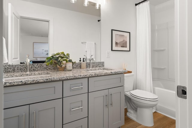 307 Panther Dr, Murfreesboro, TN 37127 - full bath with double vanity, wood finished floors, and shower / bathtub combination with curtain