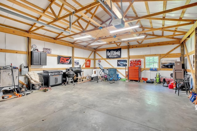 1105 Smiley Troutt Rd, Bethpage, TN 37022 - garage featuring a garage door opener