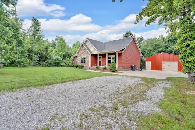 1105 Smiley Troutt Rd, Bethpage, TN 37022 - craftsman inspired home with an outdoor structure, a front lawn, a garage, and stone siding