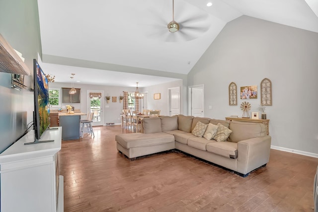 1105 Smiley Troutt Rd, Bethpage, TN 37022 - living room with wood finished floors, high vaulted ceiling, and a chandelier