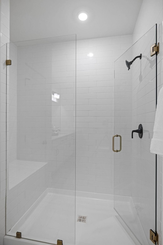6051 Mill Tree Ct, Nashville, TN 37221 - full bathroom featuring a stall shower and recessed lighting