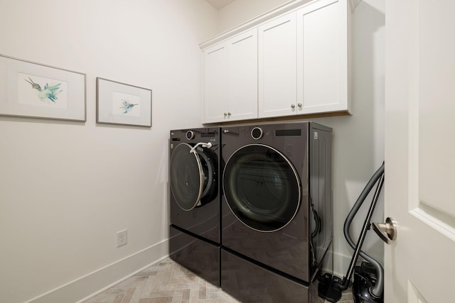 7019 Bolton St, Franklin, TN 37064 - laundry area featuring cabinet space and washer and dryer