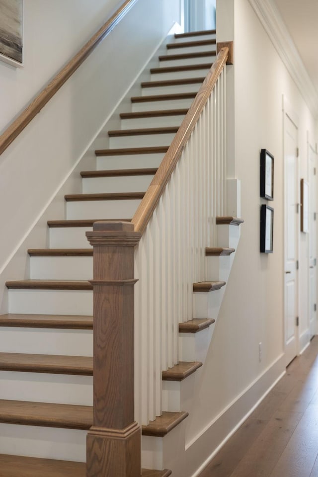 7019 Bolton St, Franklin, TN 37064 - stairs featuring wood-type flooring and ornamental molding