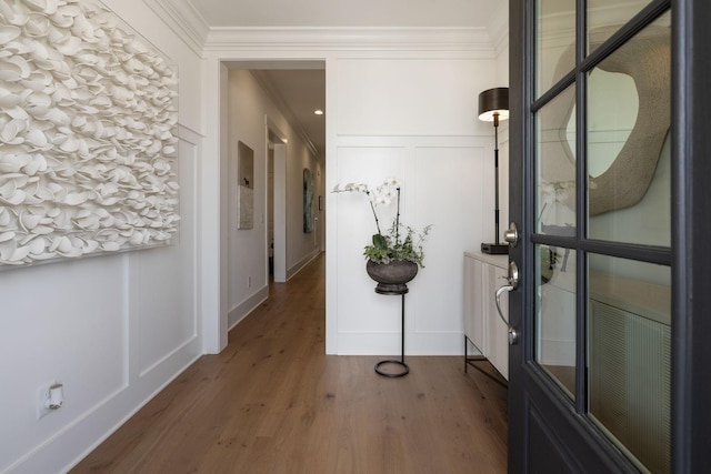7019 Bolton St, Franklin, TN 37064 - foyer featuring a decorative wall, ornamental molding, and wood finished floors