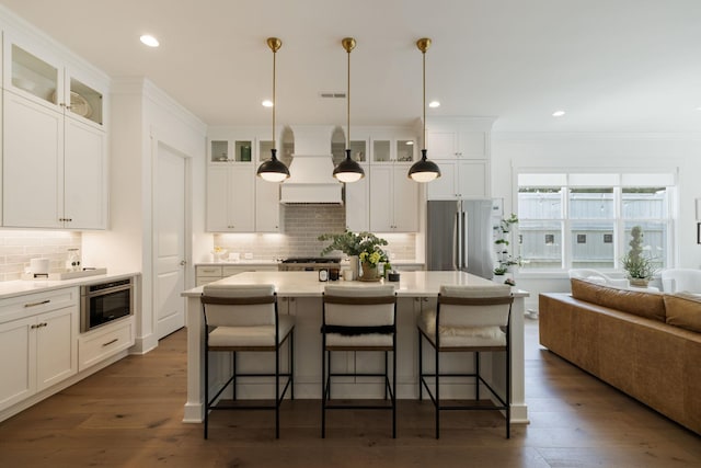 7019 Bolton St, Franklin, TN 37064 - kitchen with freestanding refrigerator, backsplash, white cabinets, glass insert cabinets, and recessed lighting