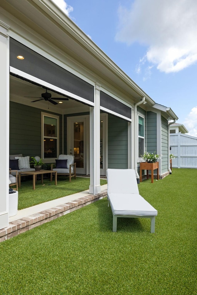 7019 Bolton St, Franklin, TN 37064 - back of property with ceiling fan and an outdoor hangout area