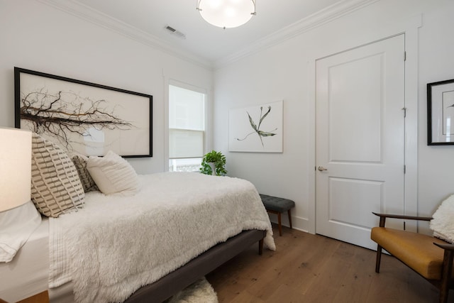 7019 Bolton St, Franklin, TN 37064 - bedroom with wood-type flooring and ornamental molding
